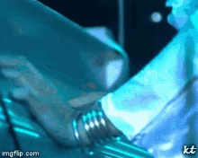 a close up of a person 's hand with a watermark that says kt