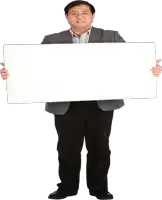 a man in a suit is holding a white board in his hands