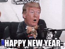 a man with donald trump 's head on his head says happy new year