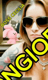 a woman wearing sunglasses and a pink bunny with a pacifier says boss cecilia