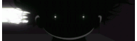 a close up of a person 's face in the dark .