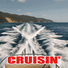 a picture of a boat in the ocean with the words cruisin written on it