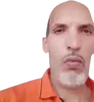 a bald man with a beard is wearing an orange shirt and making a face .