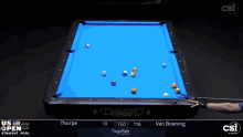a pool table with a blue cloth that says diamond