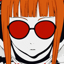 a close up of a girl wearing red glasses