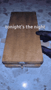a wooden box with the words tonight 's the night on it
