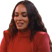 a woman is wearing a red turtleneck and looking at the camera