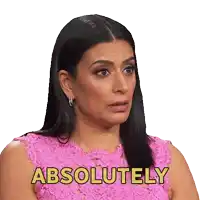 a woman in a pink dress has the word absolutely on her chest