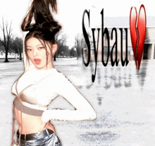a woman in a crop top stands in front of a sybau logo