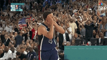 a basketball player with the number 4 on his shirt