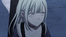 a girl with white hair and a choker looks angry