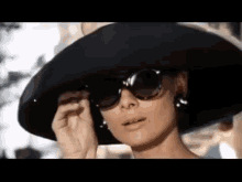 Audrey GIF - Audrey Hepburn Sabrina Sunglasses GIFs