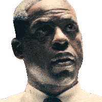 a man in a white shirt and tie is looking up