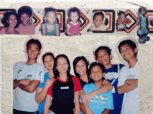 a group of people are posing for a picture and one of them is wearing a shirt that says ' ucsd '