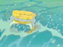 a cartoon drawing of a yellow circle with the letters j and t on it