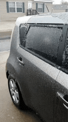 a car is covered in a thick layer of frost