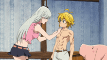a girl is touching a shirtless man 's chest while a pig looks on