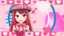a girl with red hair wearing a pink hat with a bow