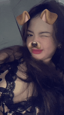 a woman with a fake dog nose and ears