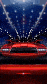 a red sports car is driving through a tunnel