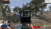 a man playing a video game with the number 378/400