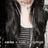 a woman with a cross on her face and the words karina + lujan = esposas on the bottom