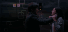 a person is jumping through a doorway in a hallway .