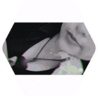 a black and white photo of a woman 's face