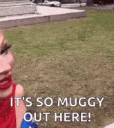 a woman in a red dress is standing in the grass with the words it 's so muggy out here .