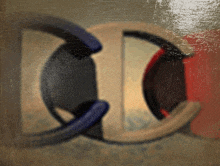 a close up of a painting with the letter d on it