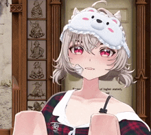 a girl wearing a sleep mask with a teddy bear on it