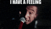 a man in a dark room with the words i have a feeling on the bottom