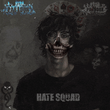 a man with a skull on his face wearing glasses and a shirt that says hate squad