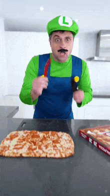 a man dressed in a luigi costume is cutting a pizza