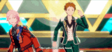 two anime characters are dancing on a stage and one of them is saying he i-yeh-d