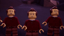 a group of lego figures standing next to each other with their arms crossed