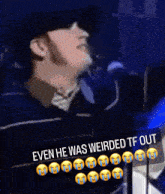 a man singing into a microphone with the words even he was weirded tf out