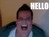 a man with his mouth open and the word hello behind him