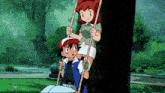 a boy and a girl are sitting on a swing in the park .