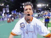 a man wearing a white jersey that says super bowl on it