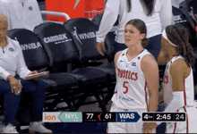 a basketball game is being played between the nyl and was team
