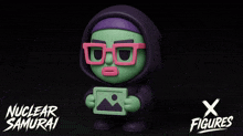 a nuclear samurai figure holding a picture next to a x figures logo