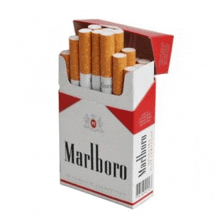 a pack of marlboro cigarettes is sitting on a table .