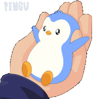 a person is holding a small blue penguin in their hand