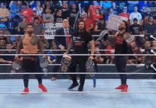 The Bloodline Undisputed Champions Wwe GIF - The Bloodline Undisputed Champions Wwe GIFs