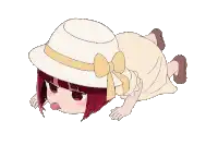 a cartoon girl wearing a hat and a dress is laying on the floor .