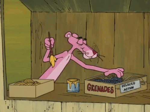 a pink panther is standing next to a box of grenade delayed action