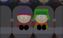 two south park characters are sitting next to each other with their legs crossed
