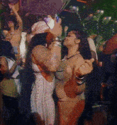 a woman in a white dress holds a can of bud light