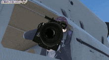 a cartoon character holding a camera with the letter ok on it
